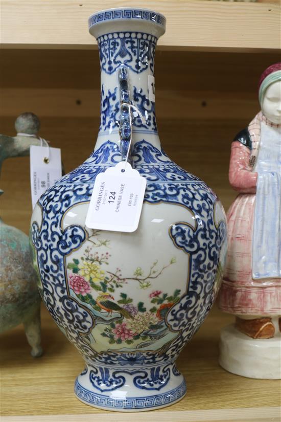A Chinese famille rose and blue and white vase